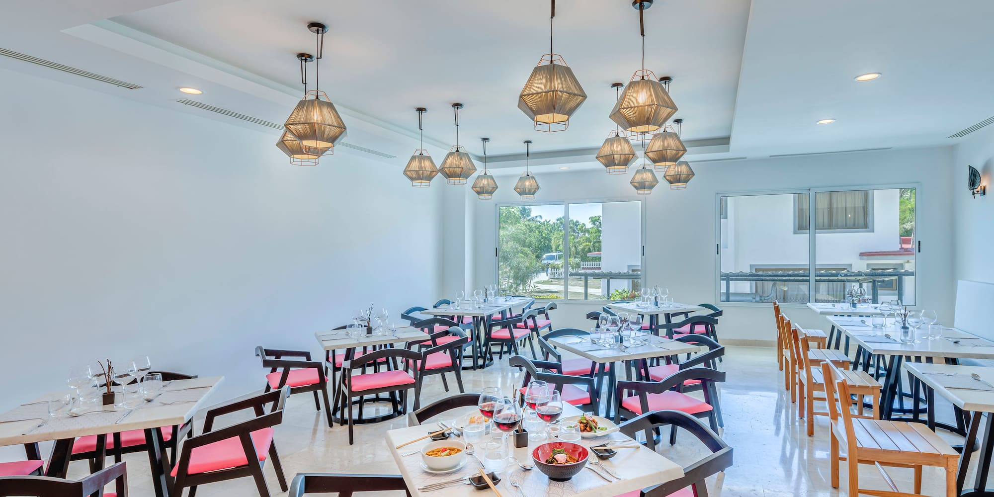 a room with tables and chairs