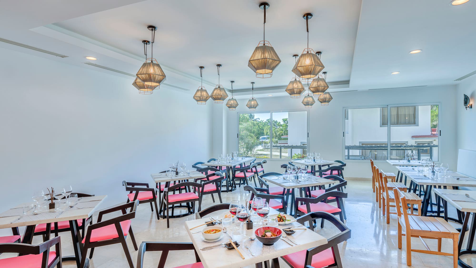 a room with tables and chairs