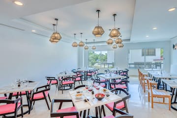 a room with tables and chairs