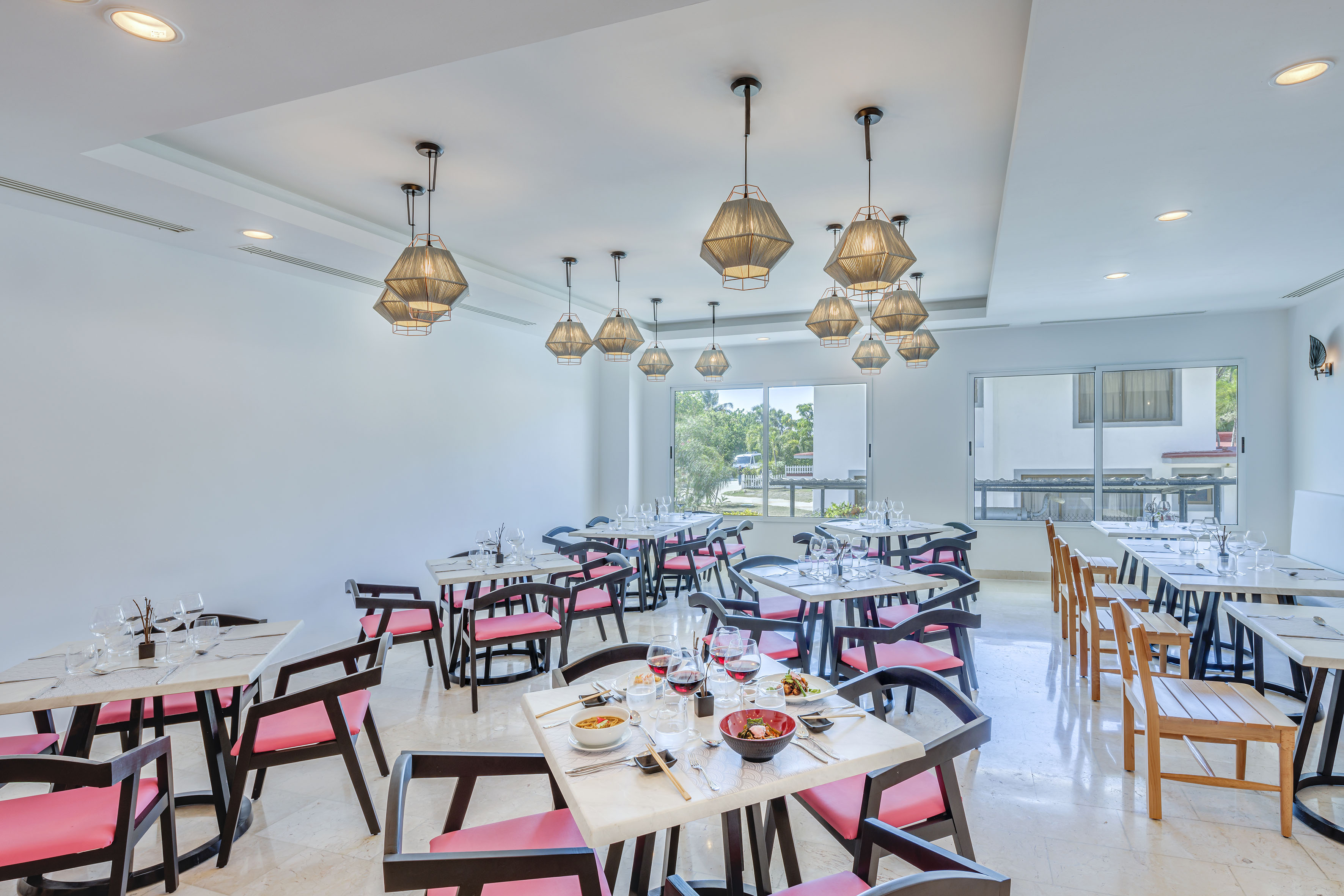 a room with tables and chairs