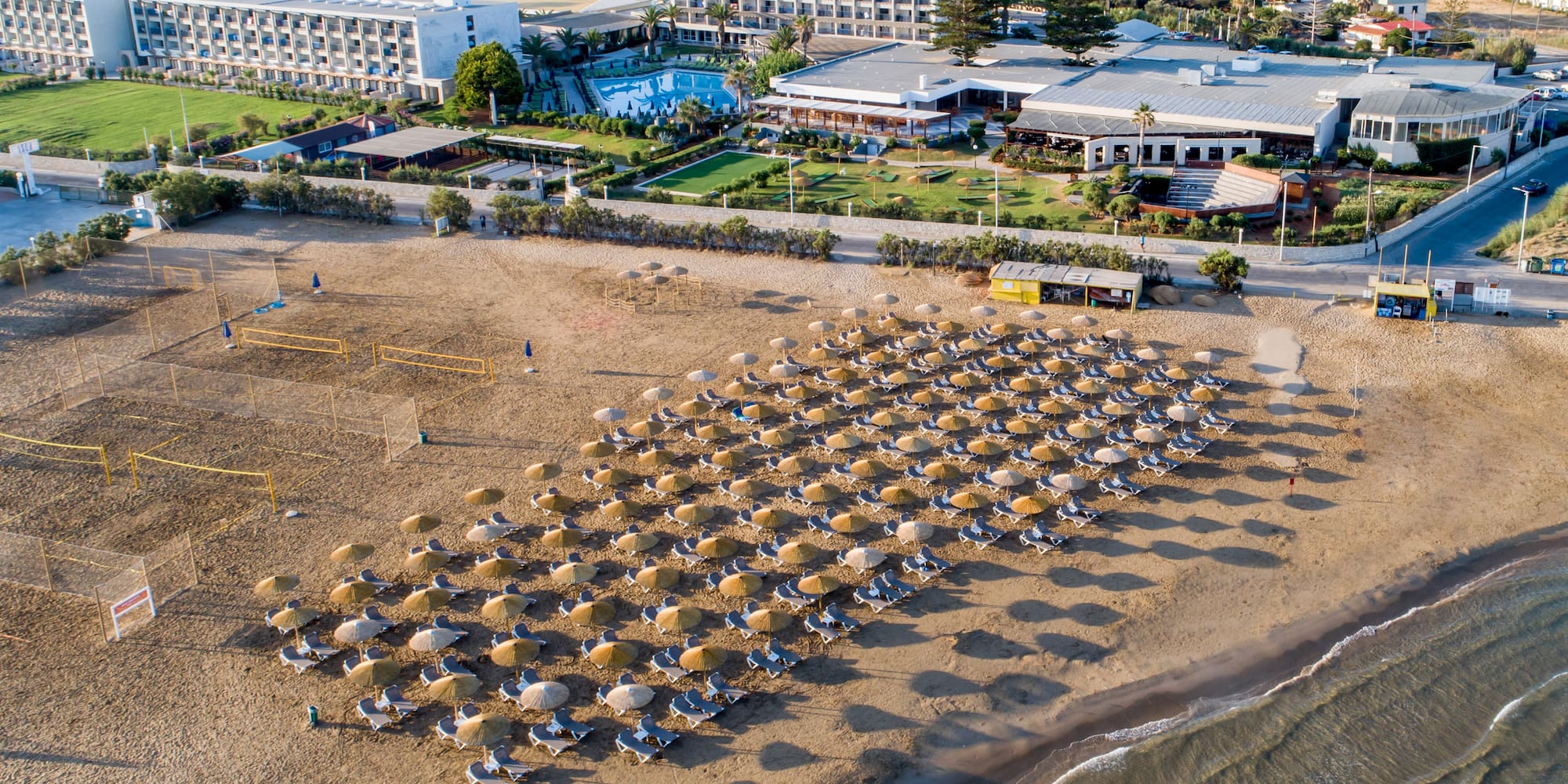 a group of umbrellas on a beach