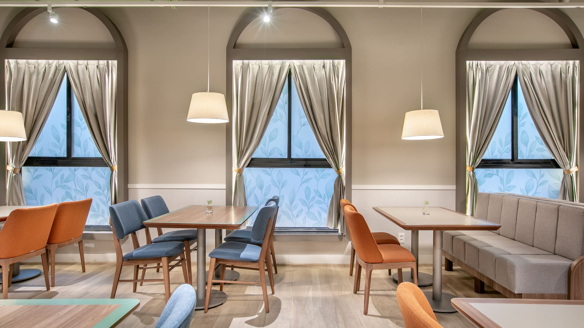 a room with tables and chairs