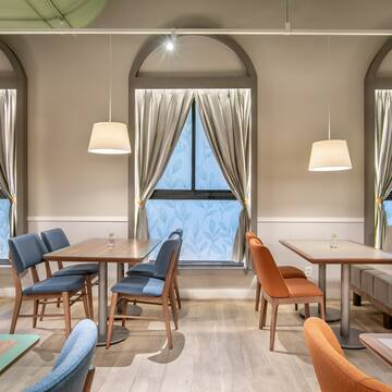 a room with tables and chairs