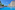 a large pool with chairs and umbrellas in front of a building