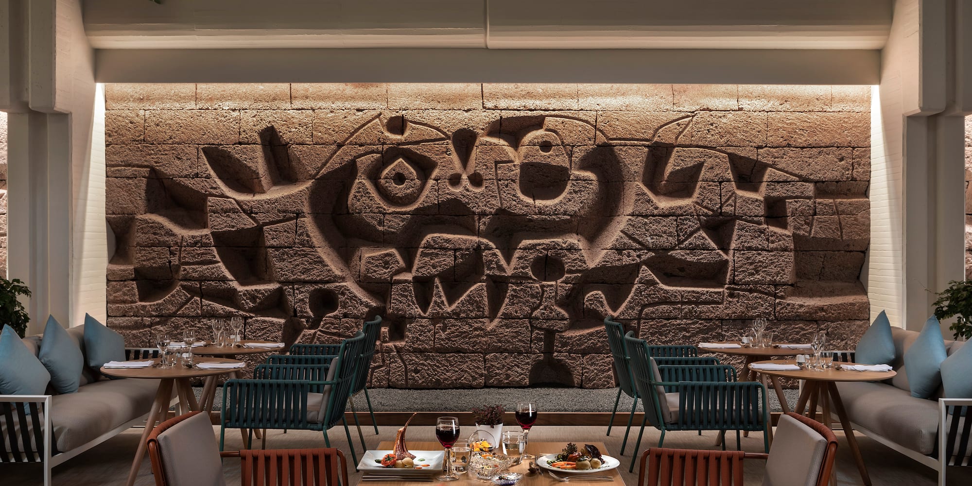 a restaurant with tables and chairs