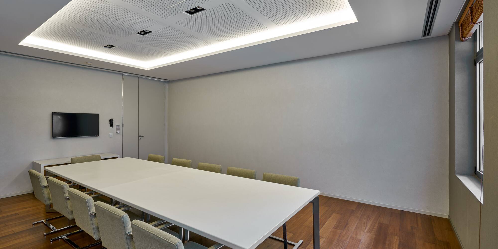 a room with a table and chairs