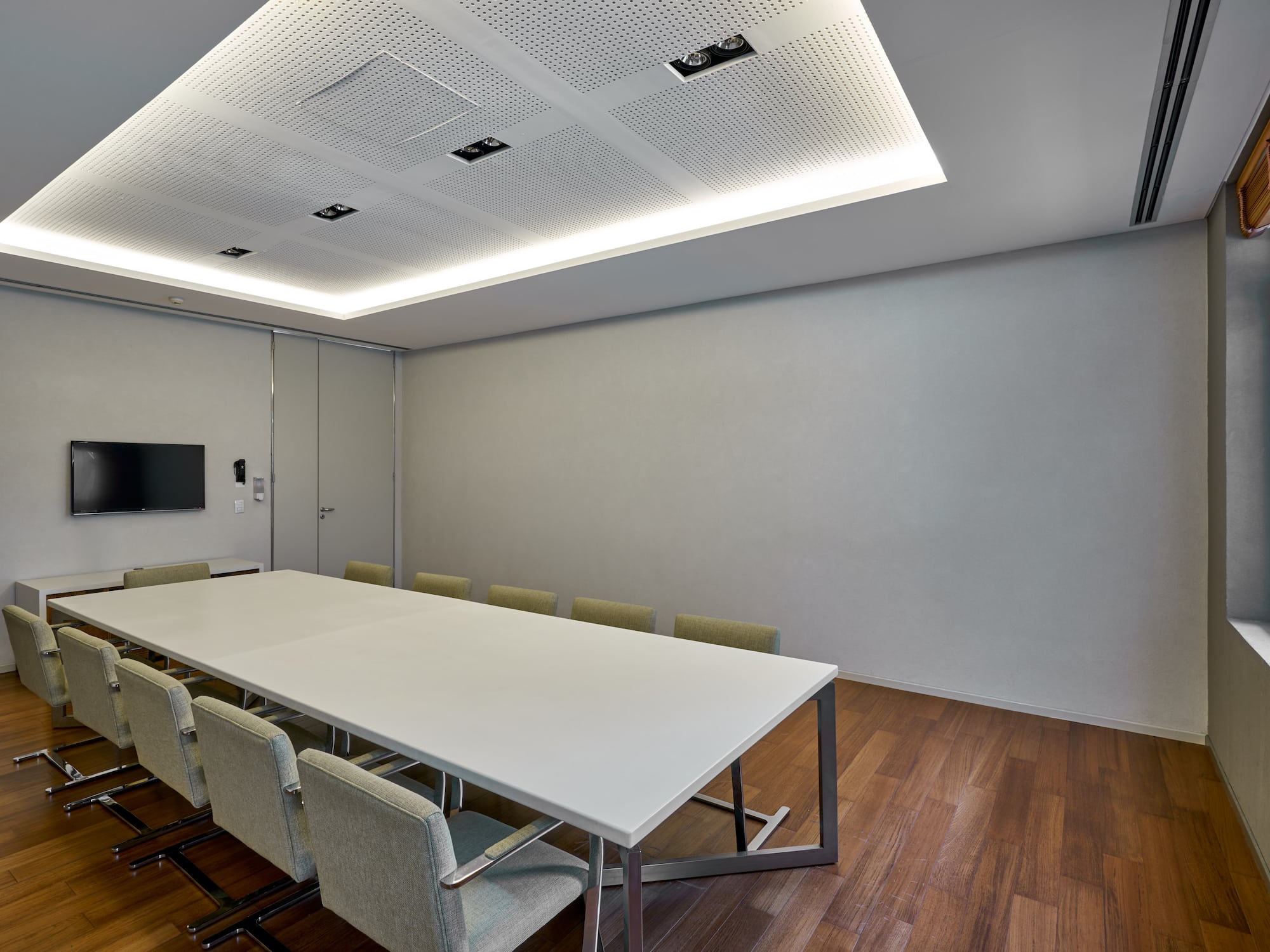 a room with a table and chairs