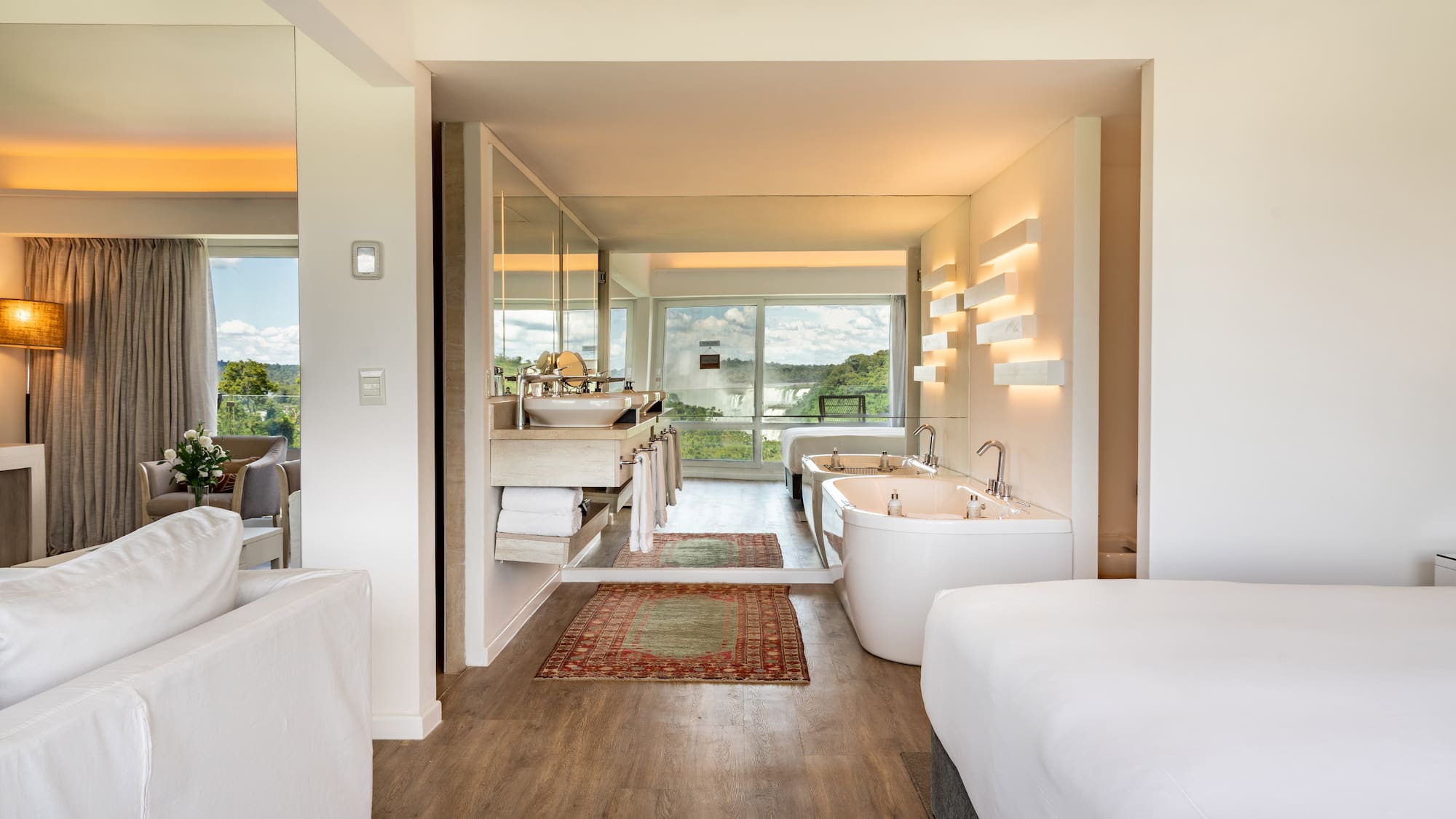 a room with a bed and a bathtub