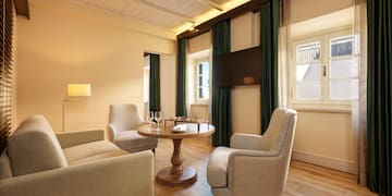 a room with a table and chairs