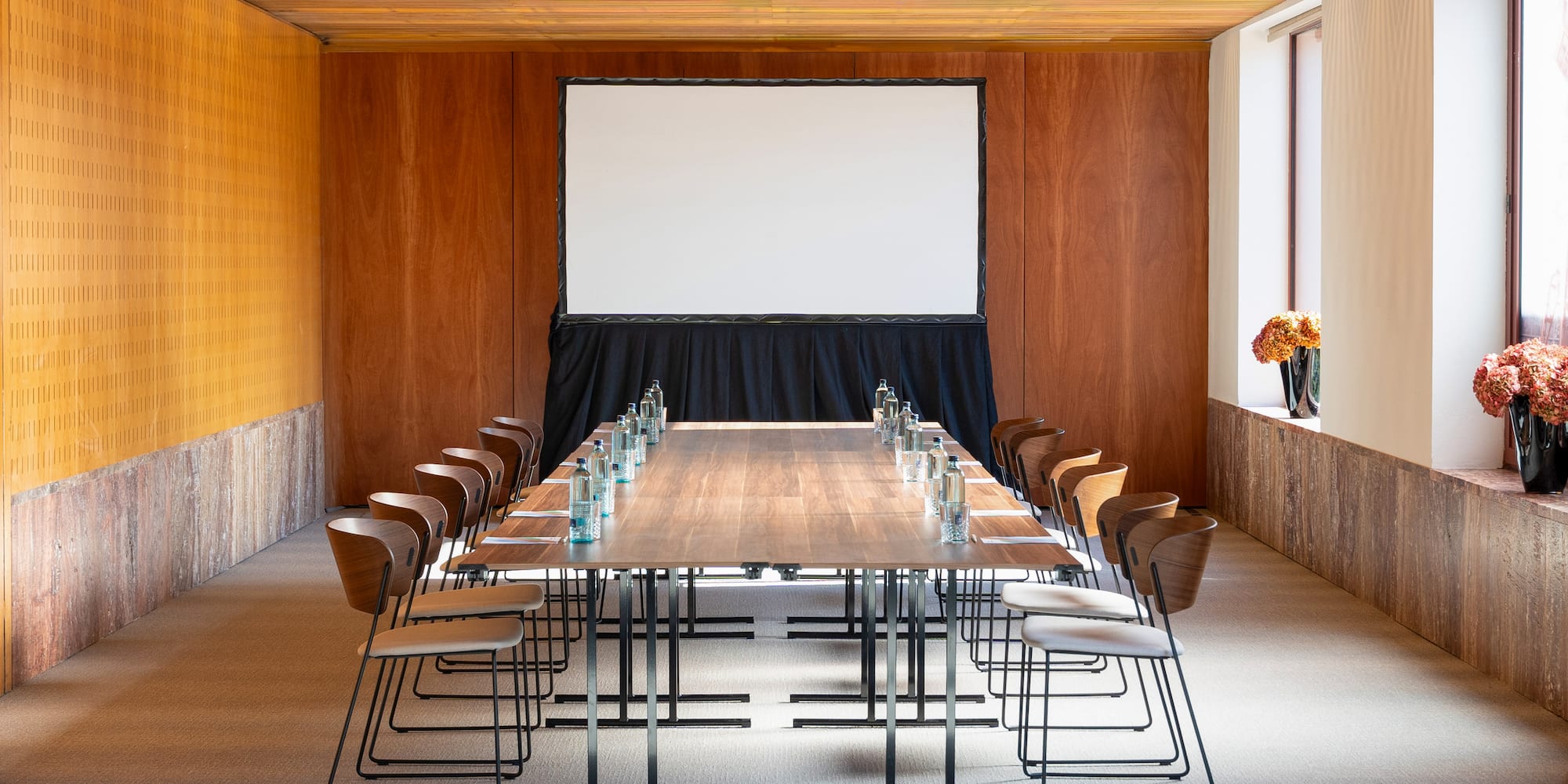 a room with a table and chairs