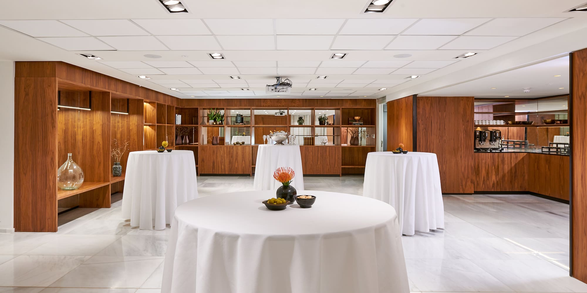 a room with tables and chairs