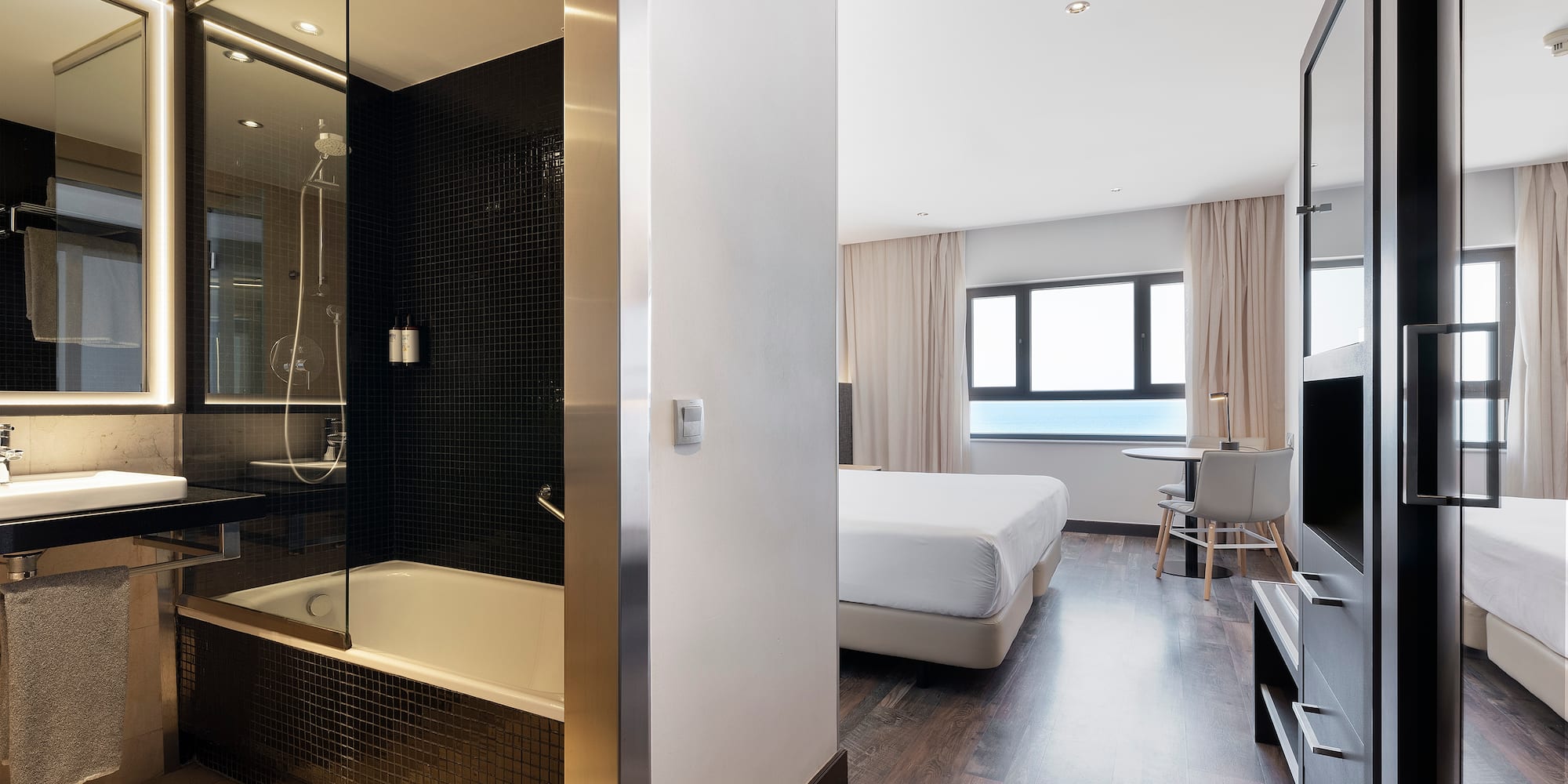 a room with a bed and a shower