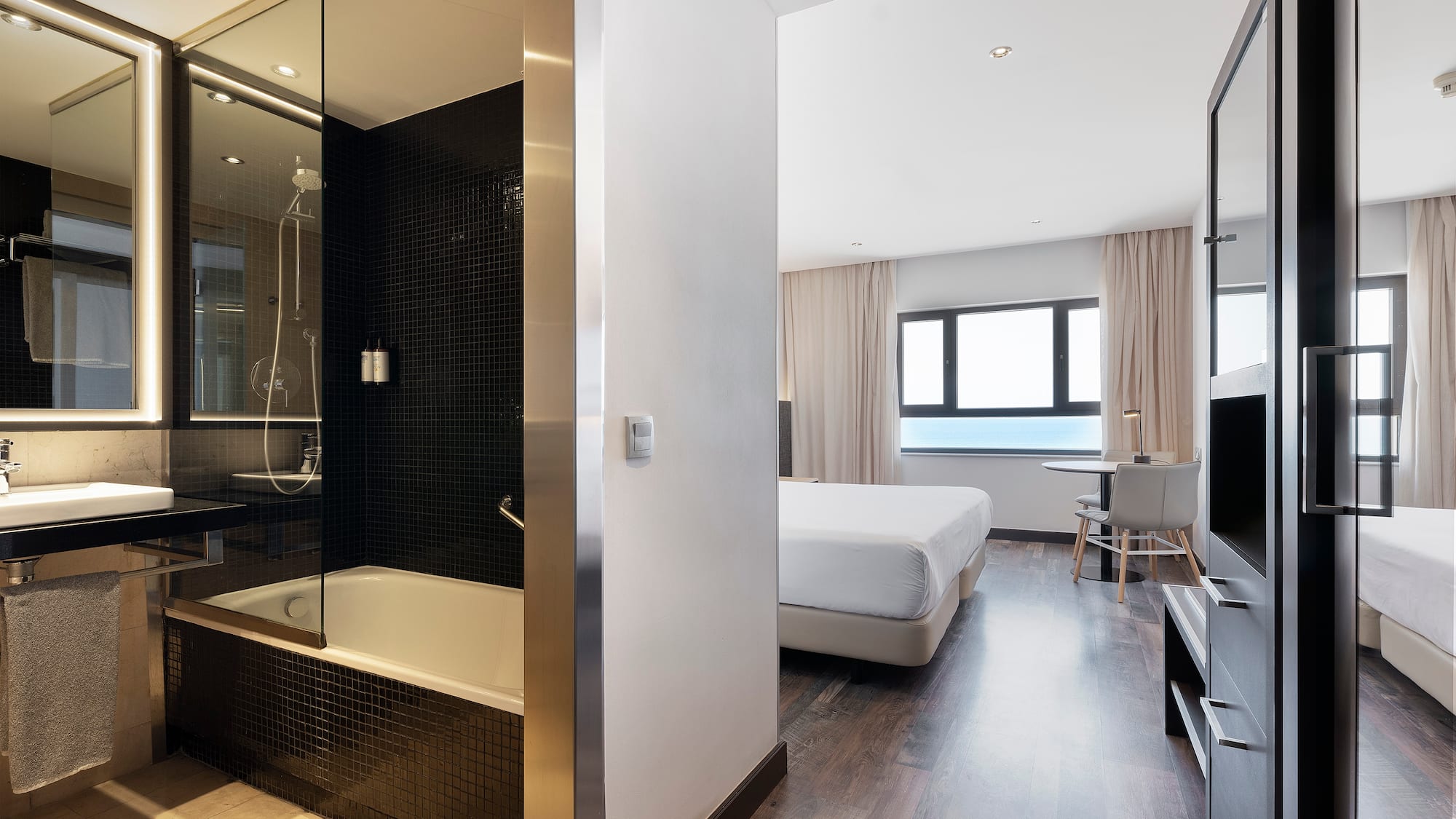 a room with a bed and a shower