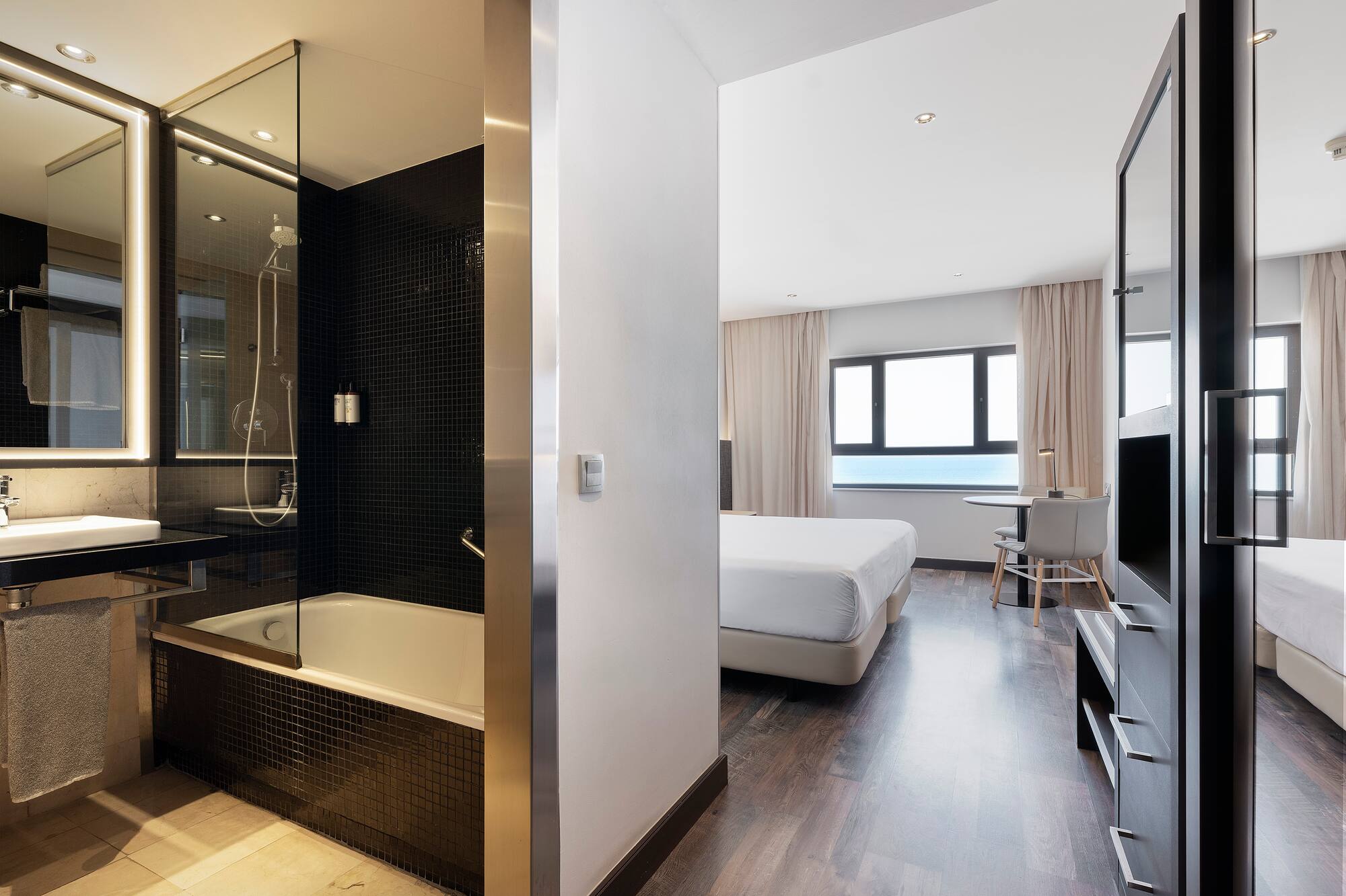 a room with a bed and a shower