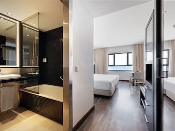 a room with a bed and a shower