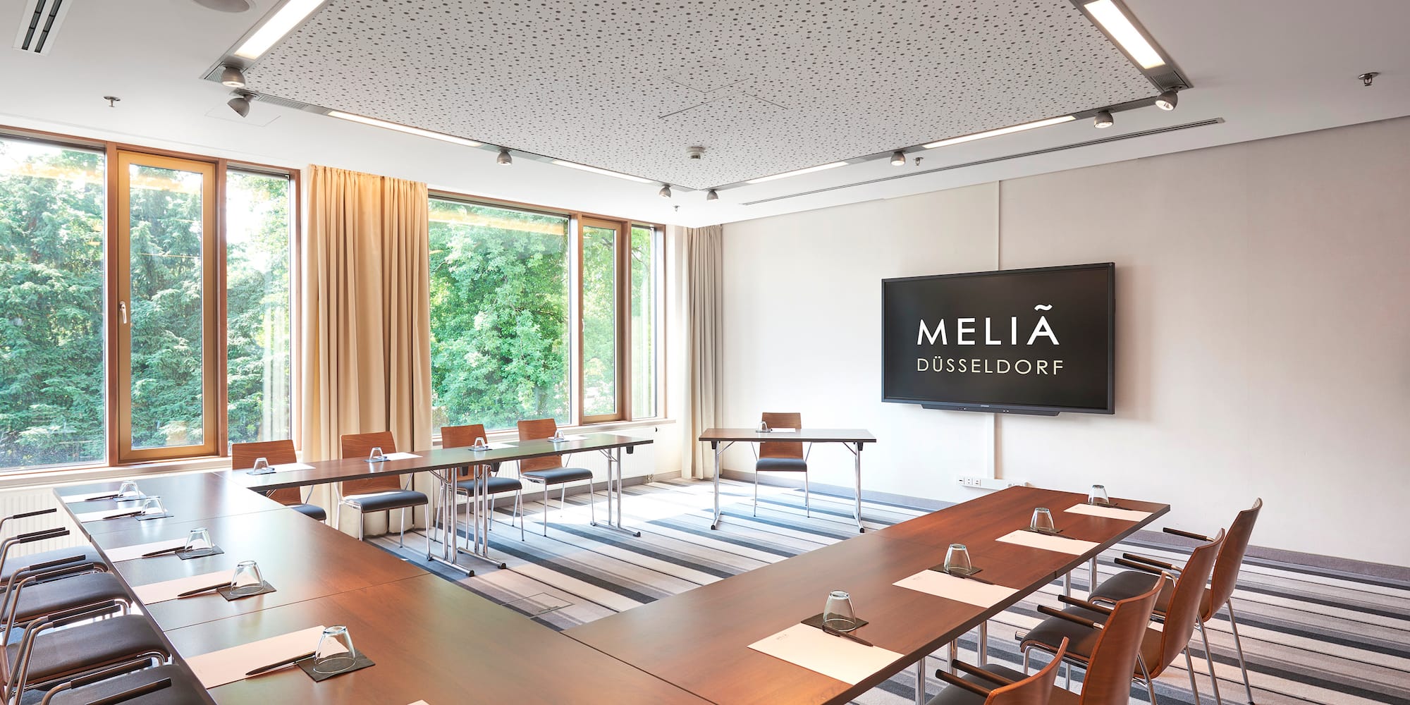 a room with tables and chairs