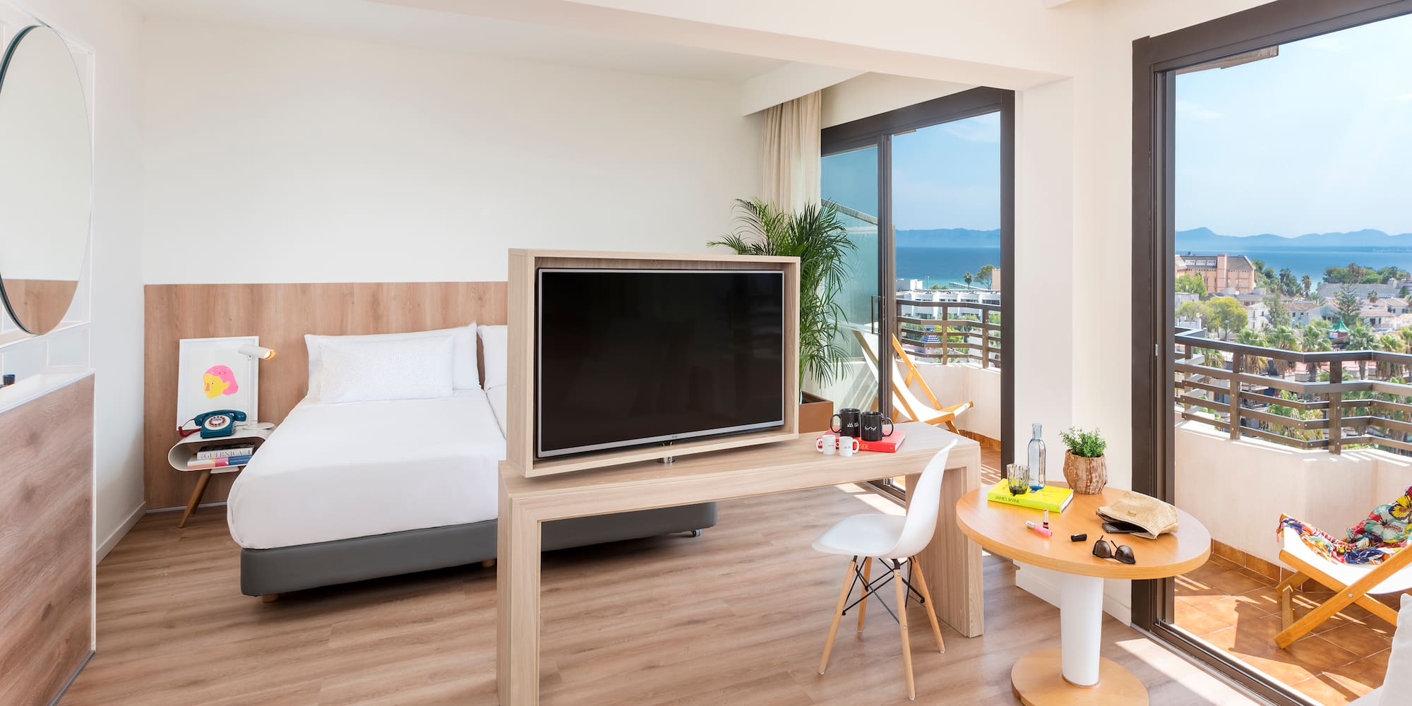 a room with a television and a bed