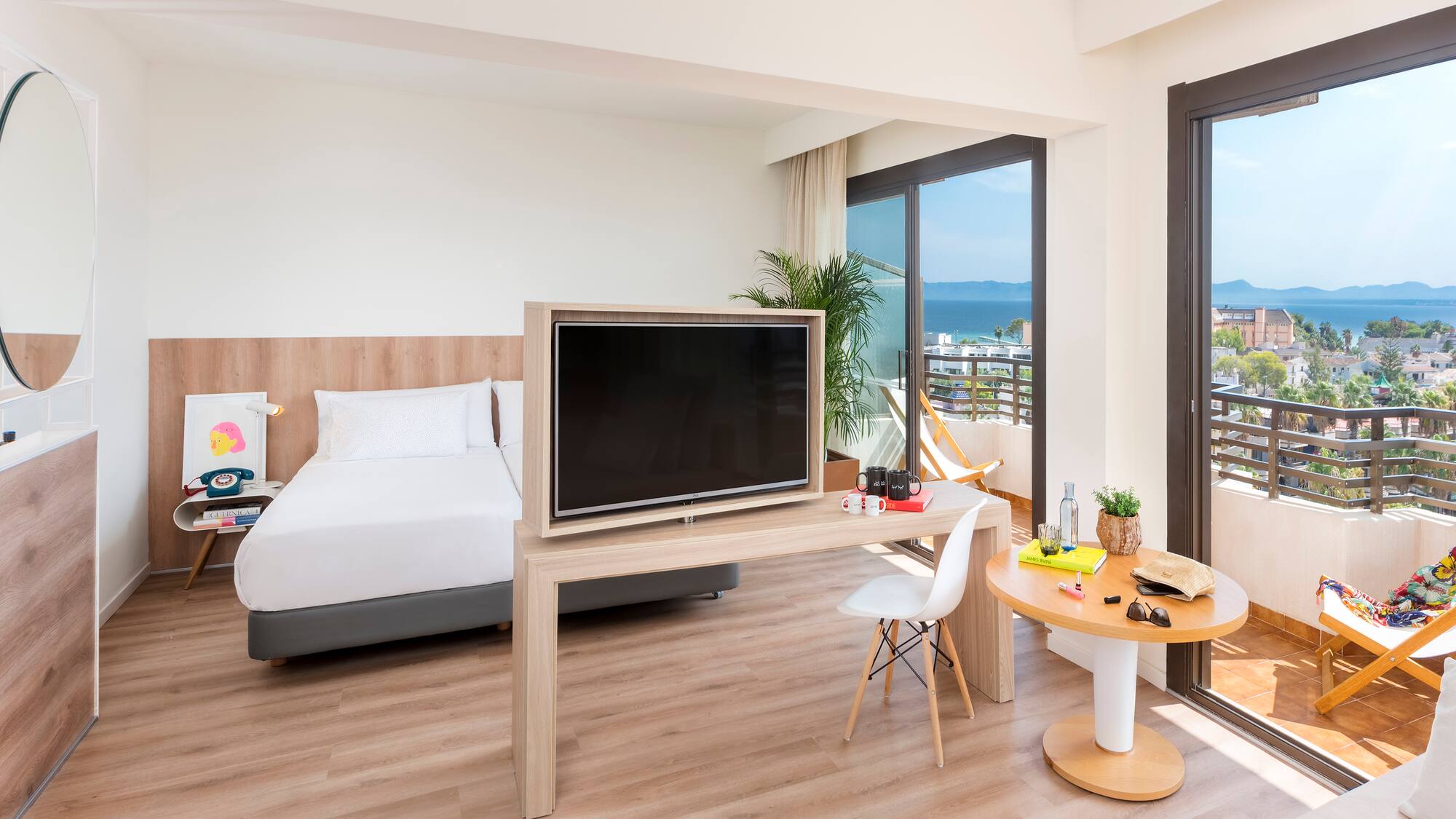 a room with a television and a bed