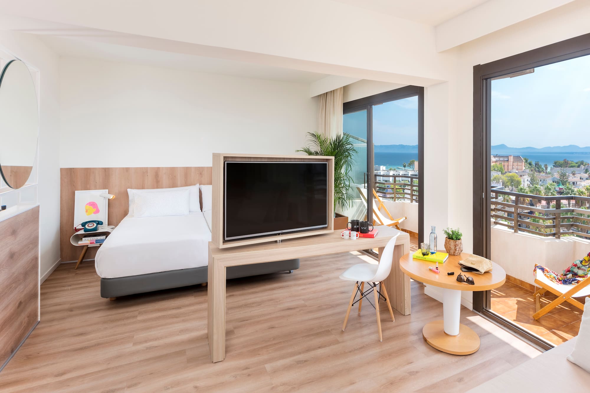 a room with a television and a bed