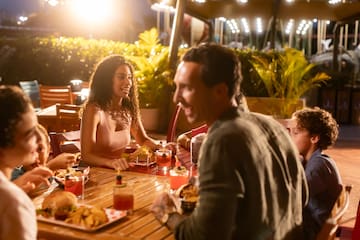 a group of people sitting at a table