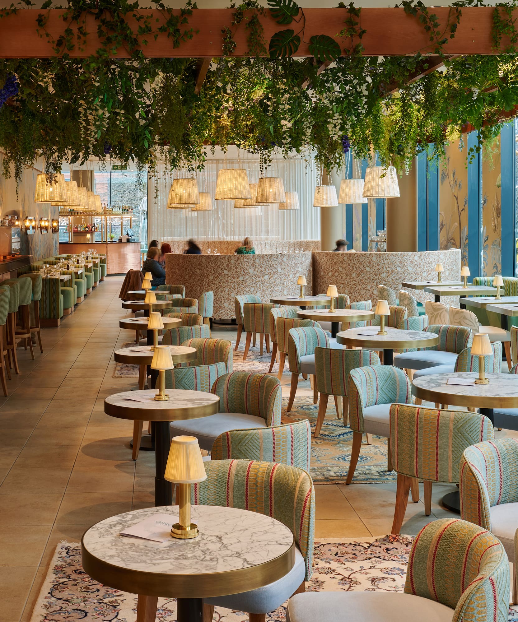 a restaurant with tables and chairs