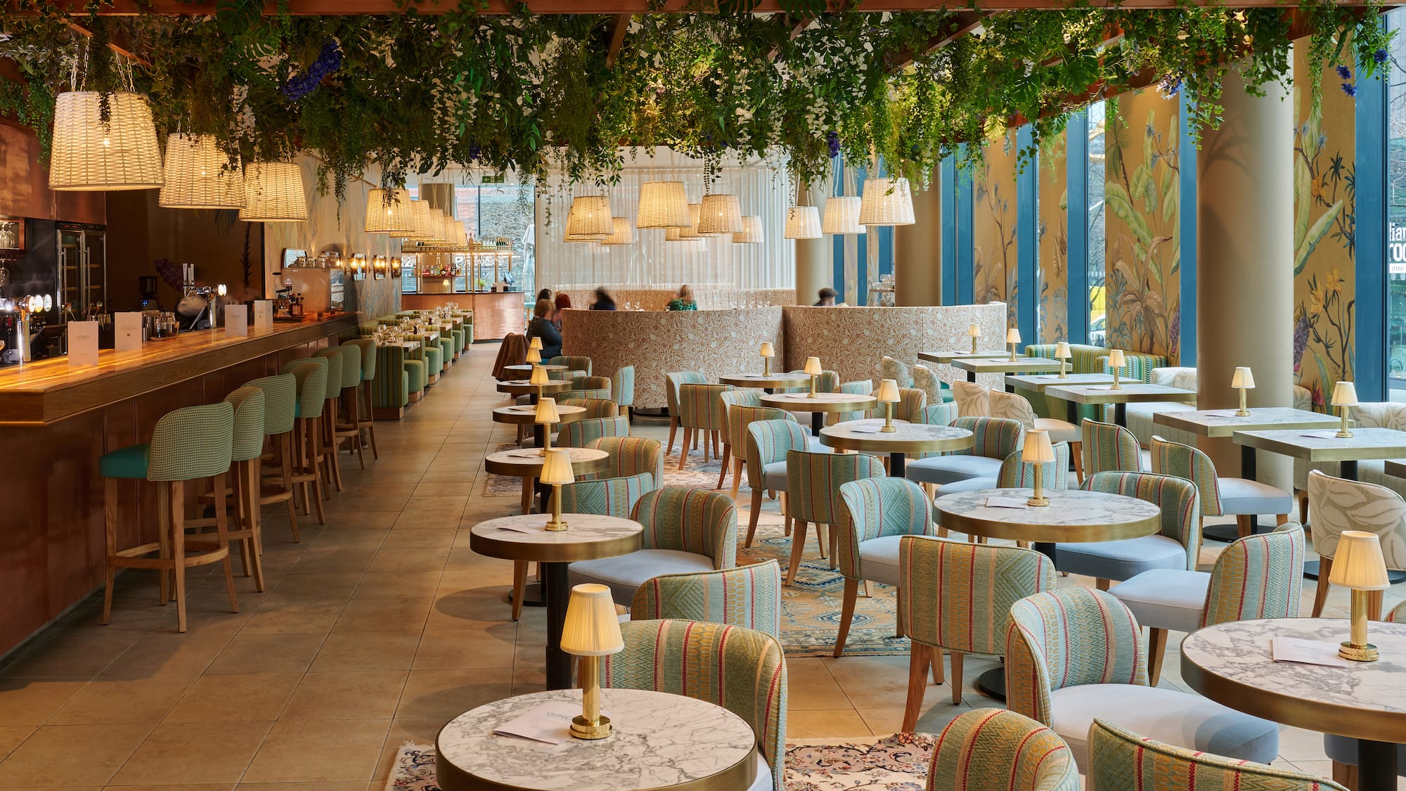 a restaurant with tables and chairs