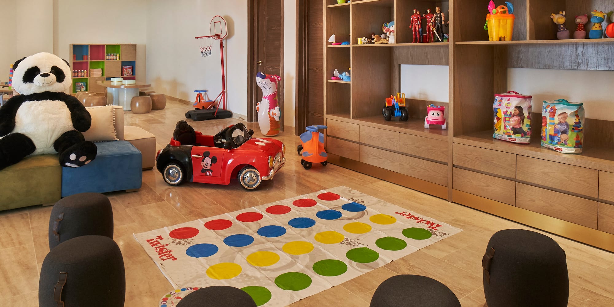 a room with a game and toys