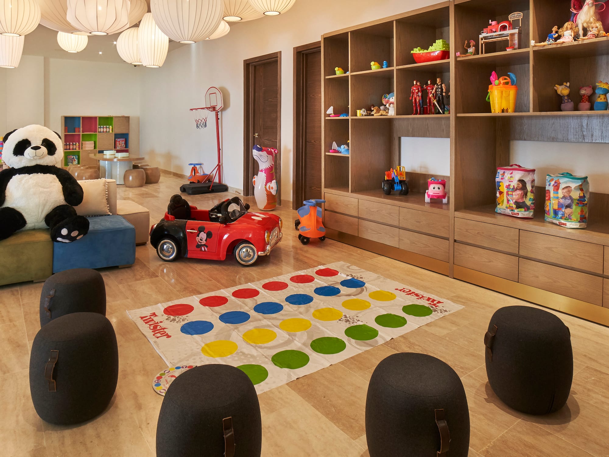 a room with a game and toys