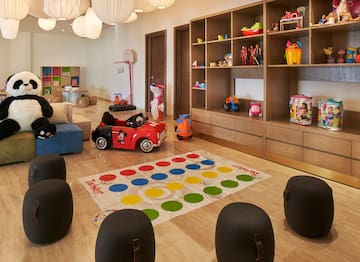 a room with a game and toys