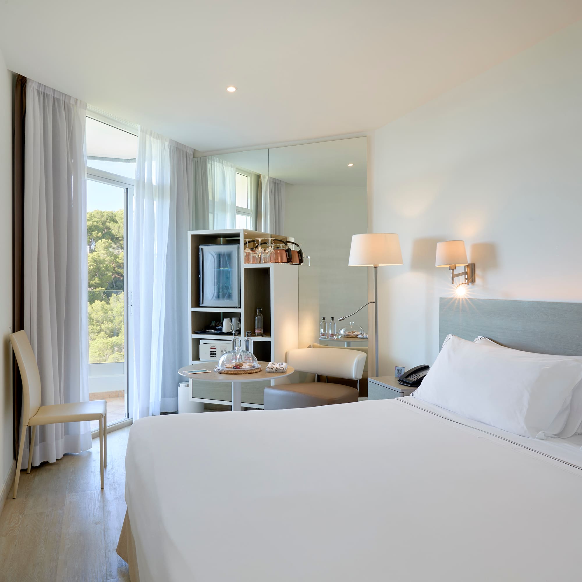 a room with a bed and a table