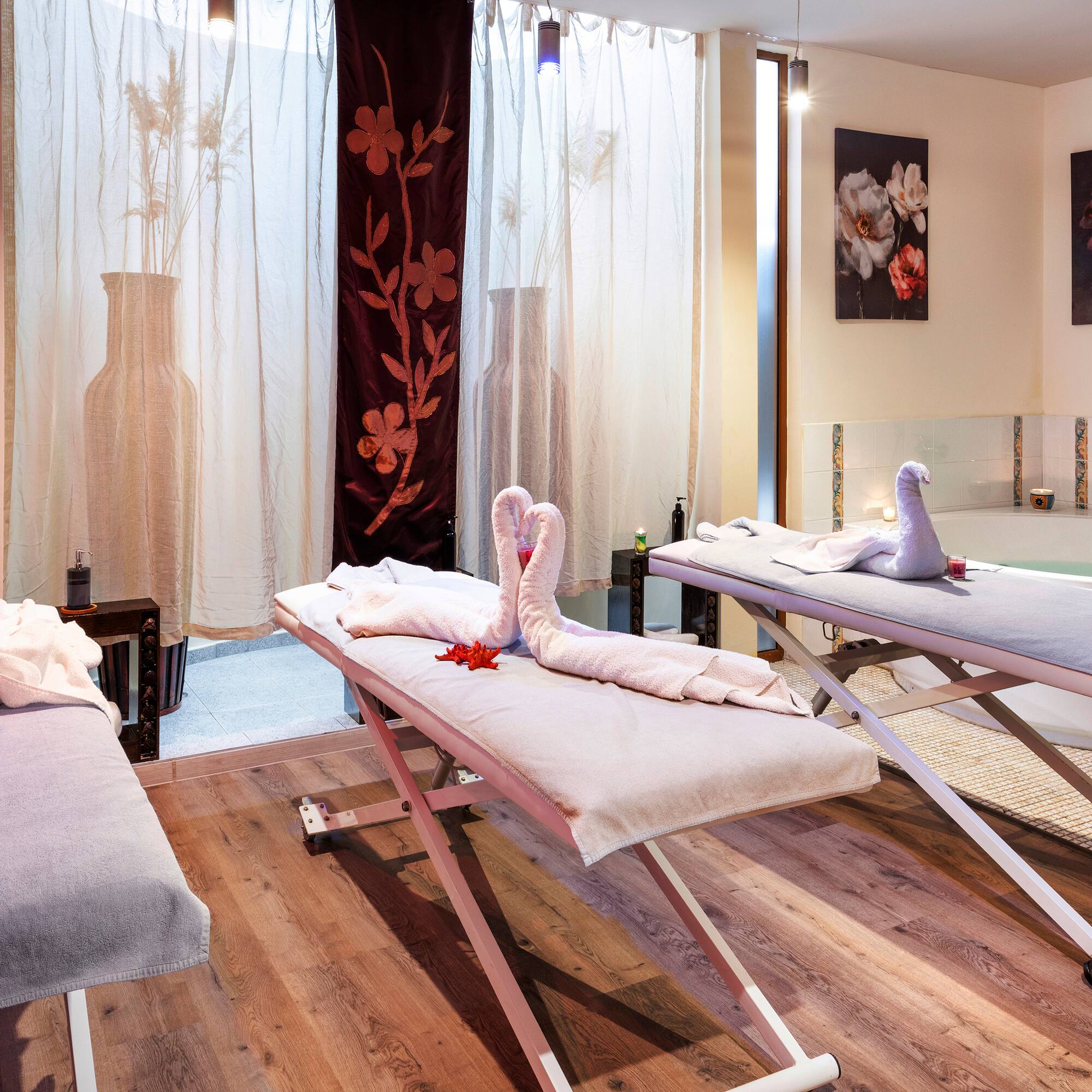 a massage table with towels and towels on it