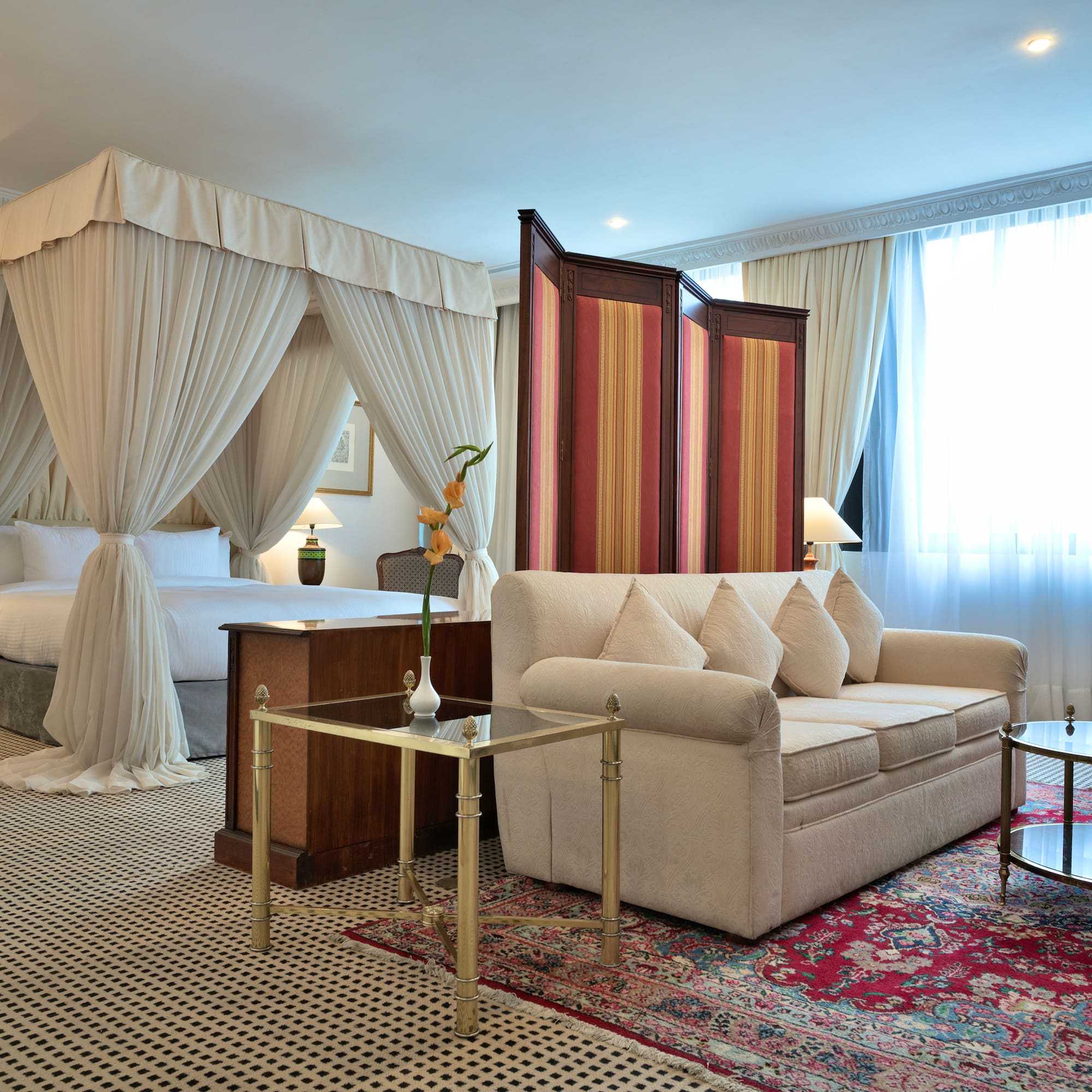 a room with a bed and a couch