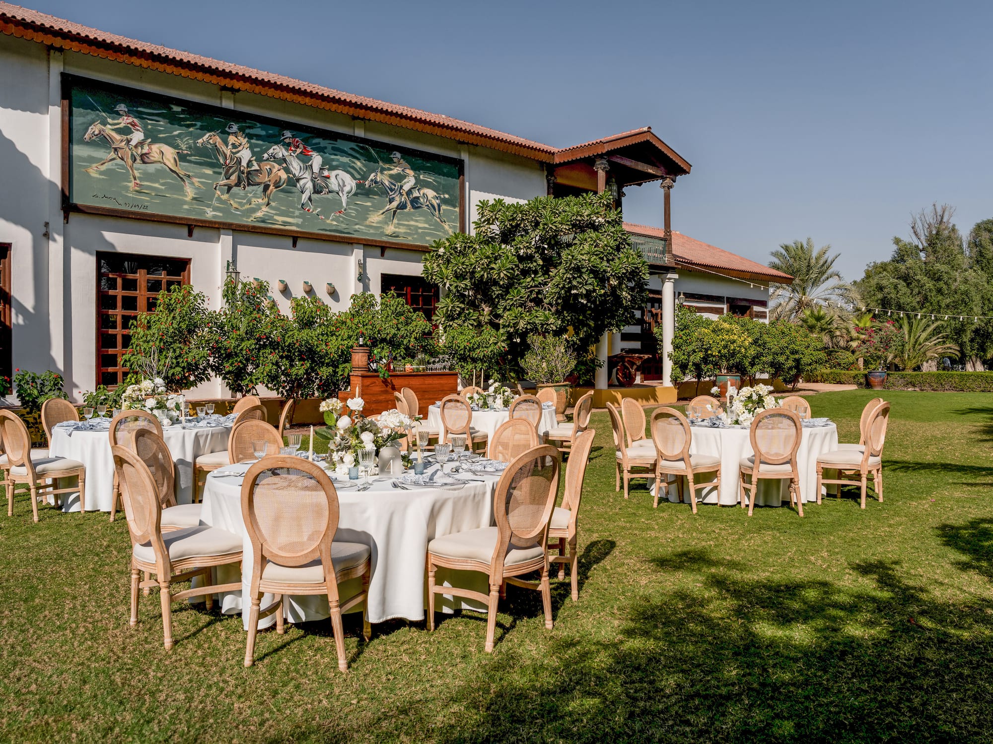 a group of tables outside a building