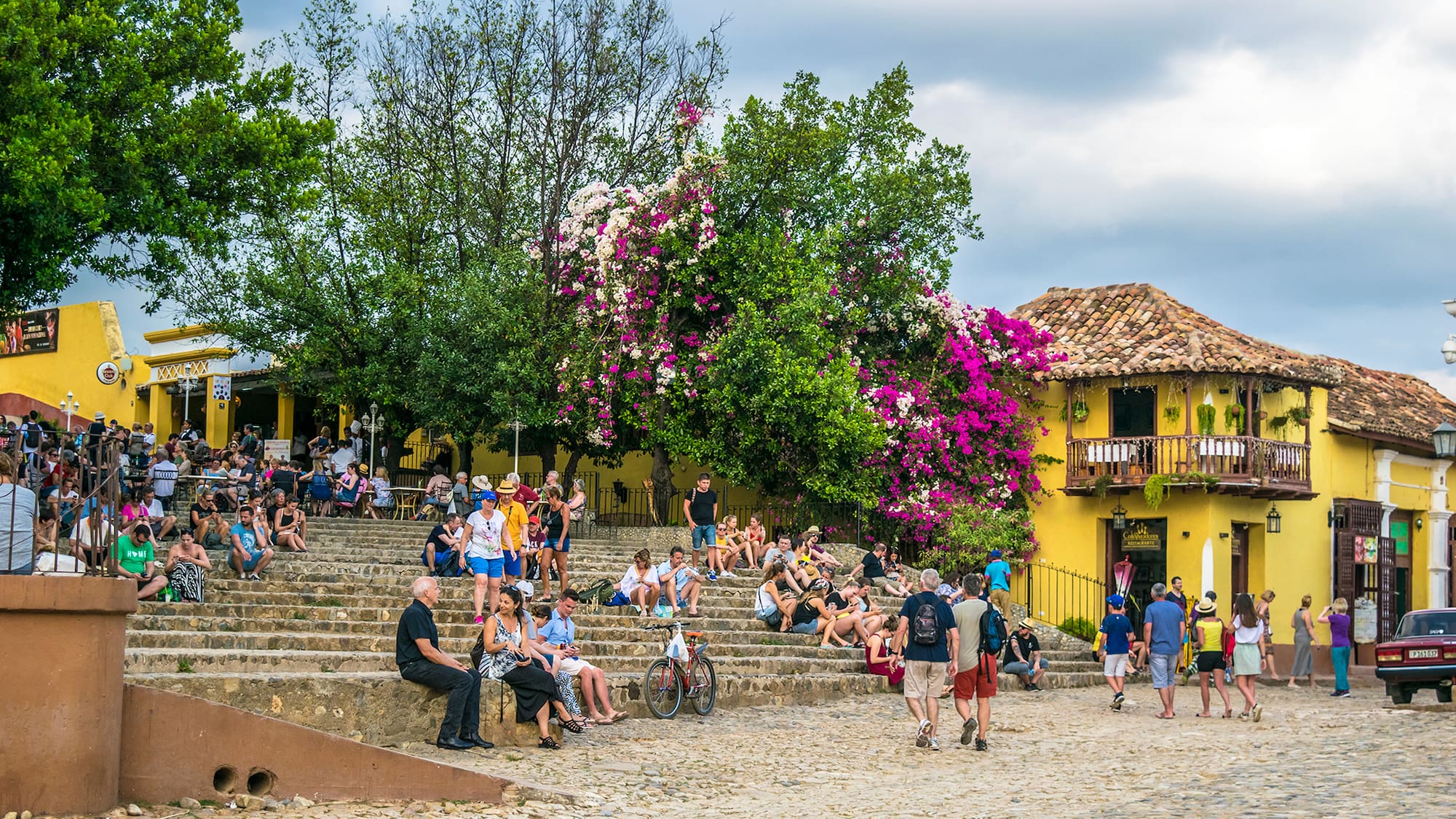 a group of people sitting on stairs