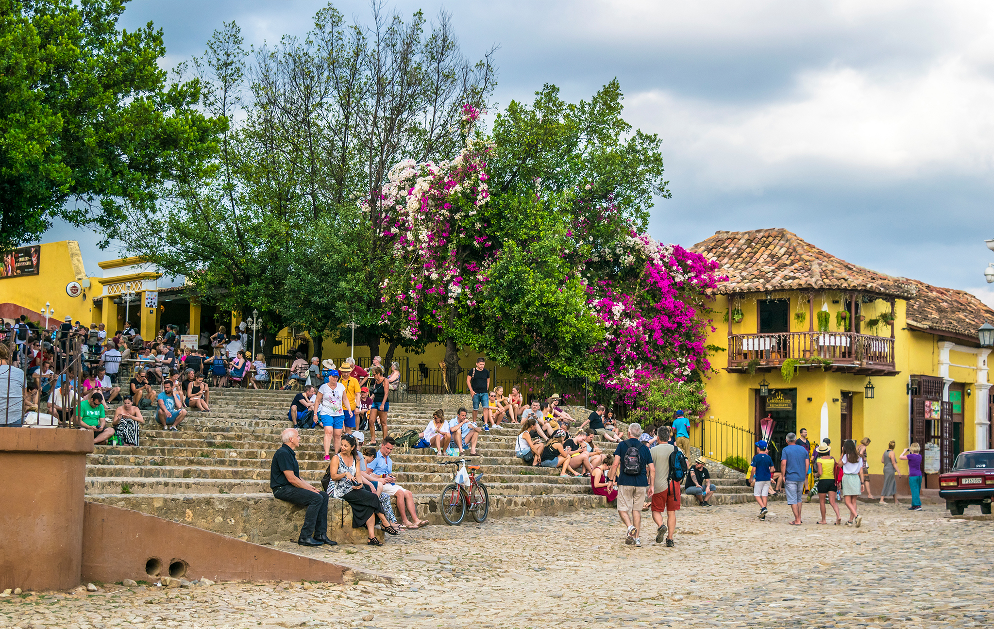 a group of people sitting on stairs