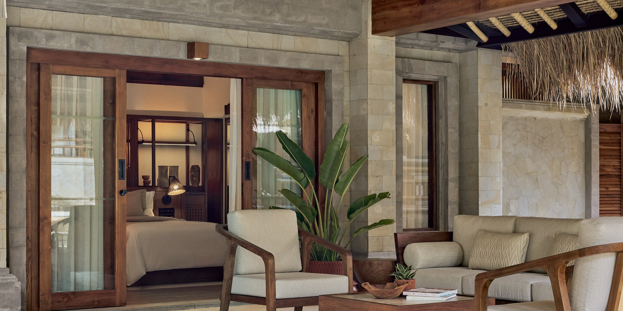 a patio area with chairs and a table