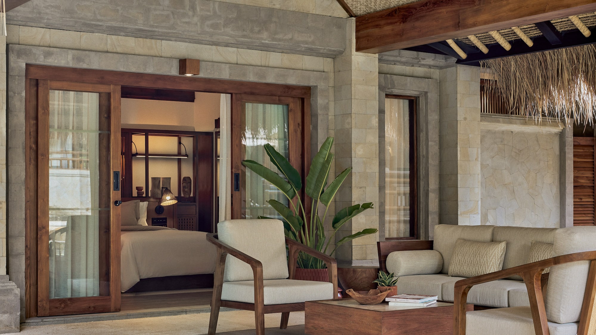 a patio area with chairs and a table