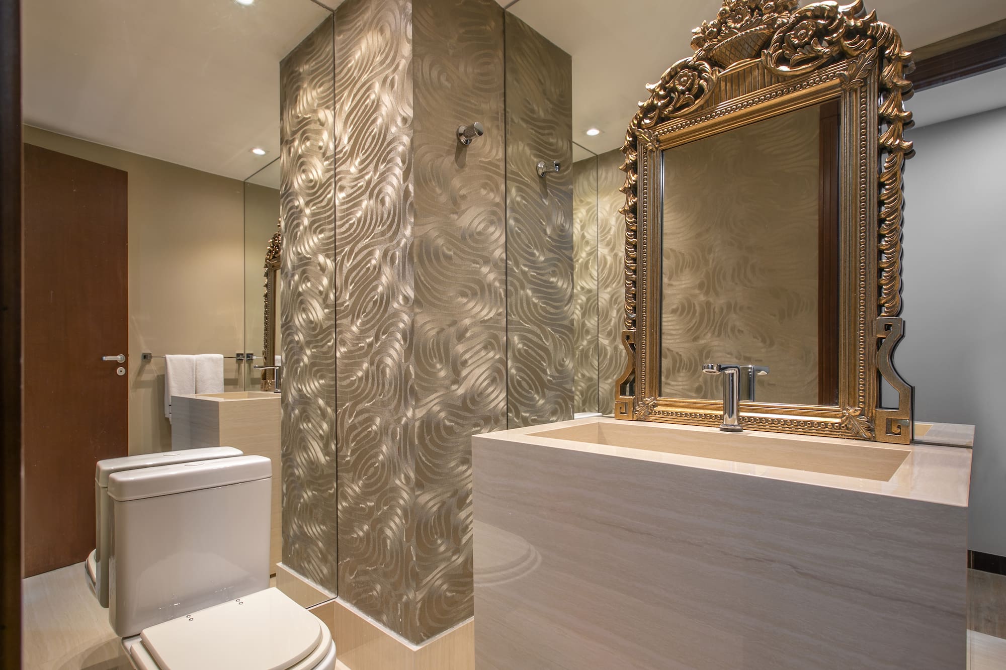 a bathroom with a mirror and a sink