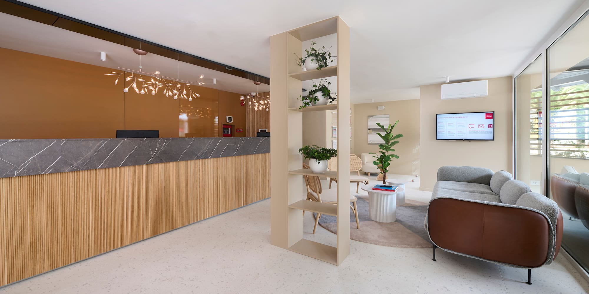 a room with a reception desk and a couch