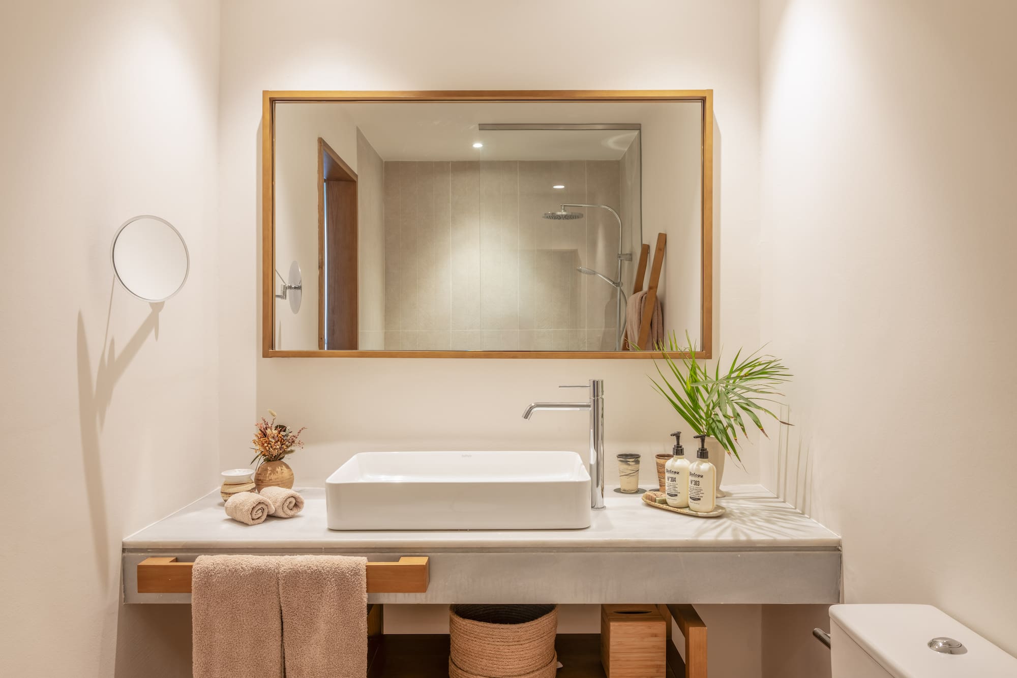 a bathroom with a mirror and sink