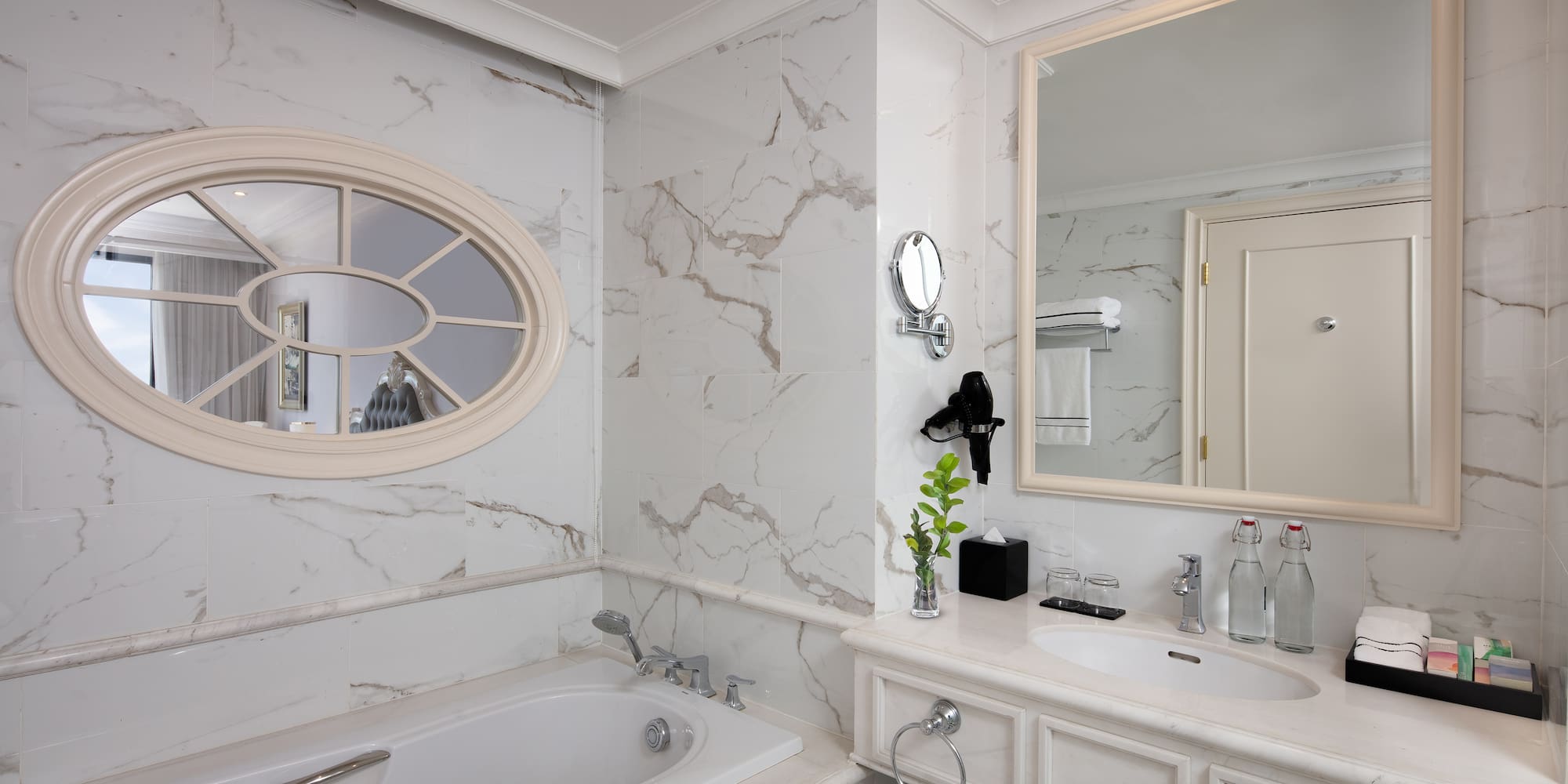 a bathroom with a tub and sink