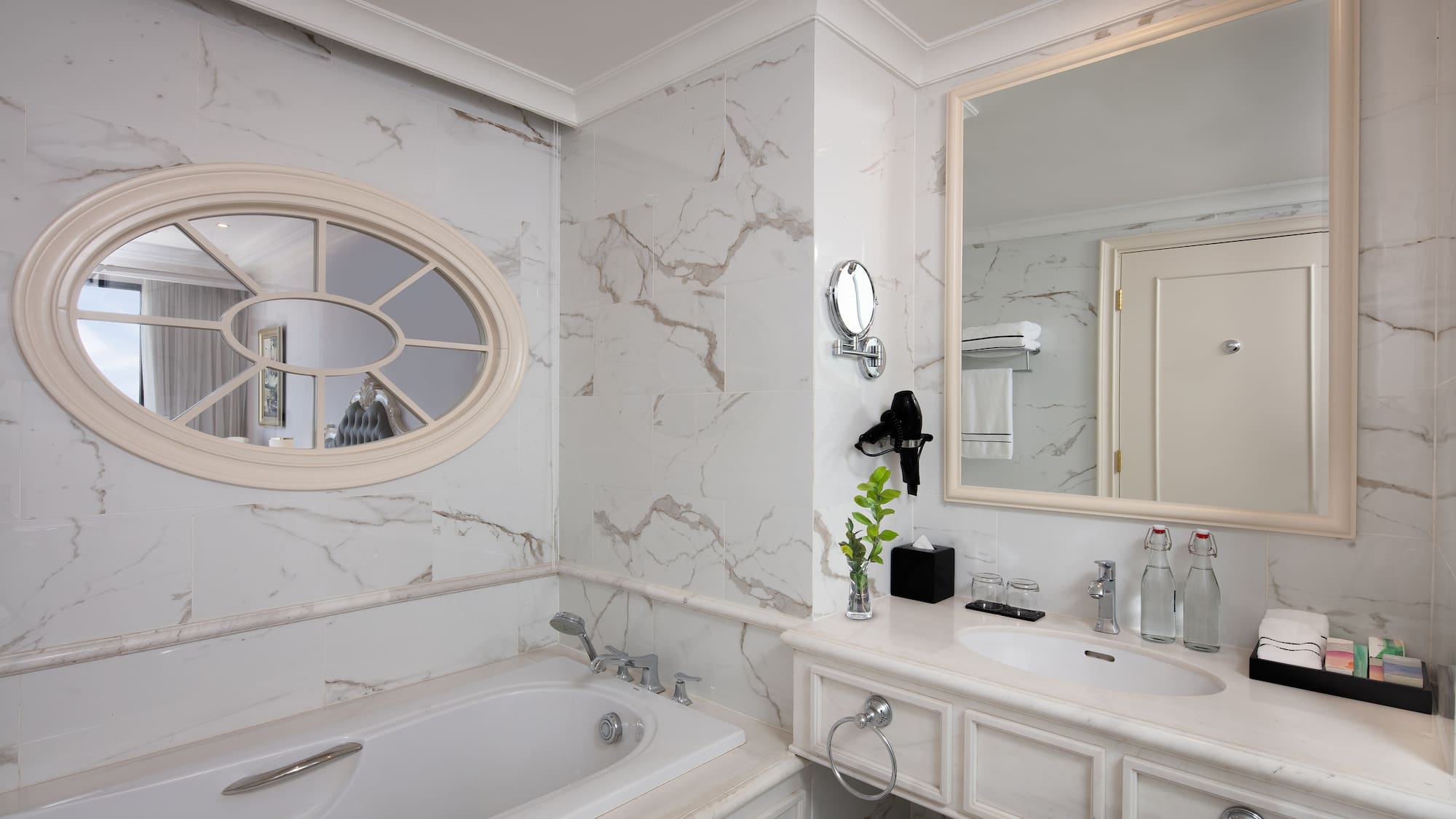 a bathroom with a tub and sink
