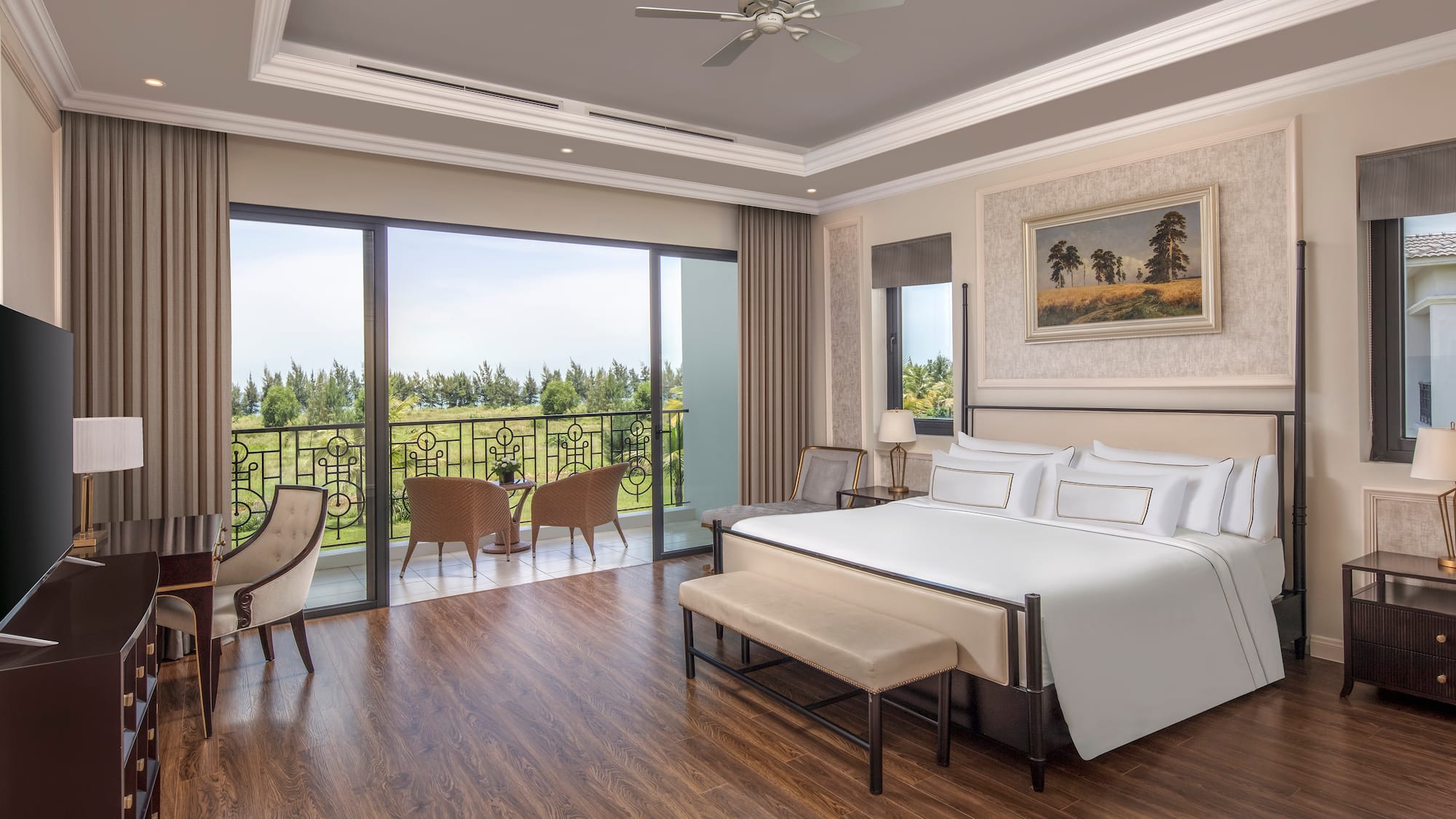 a bedroom with a bed and chairs