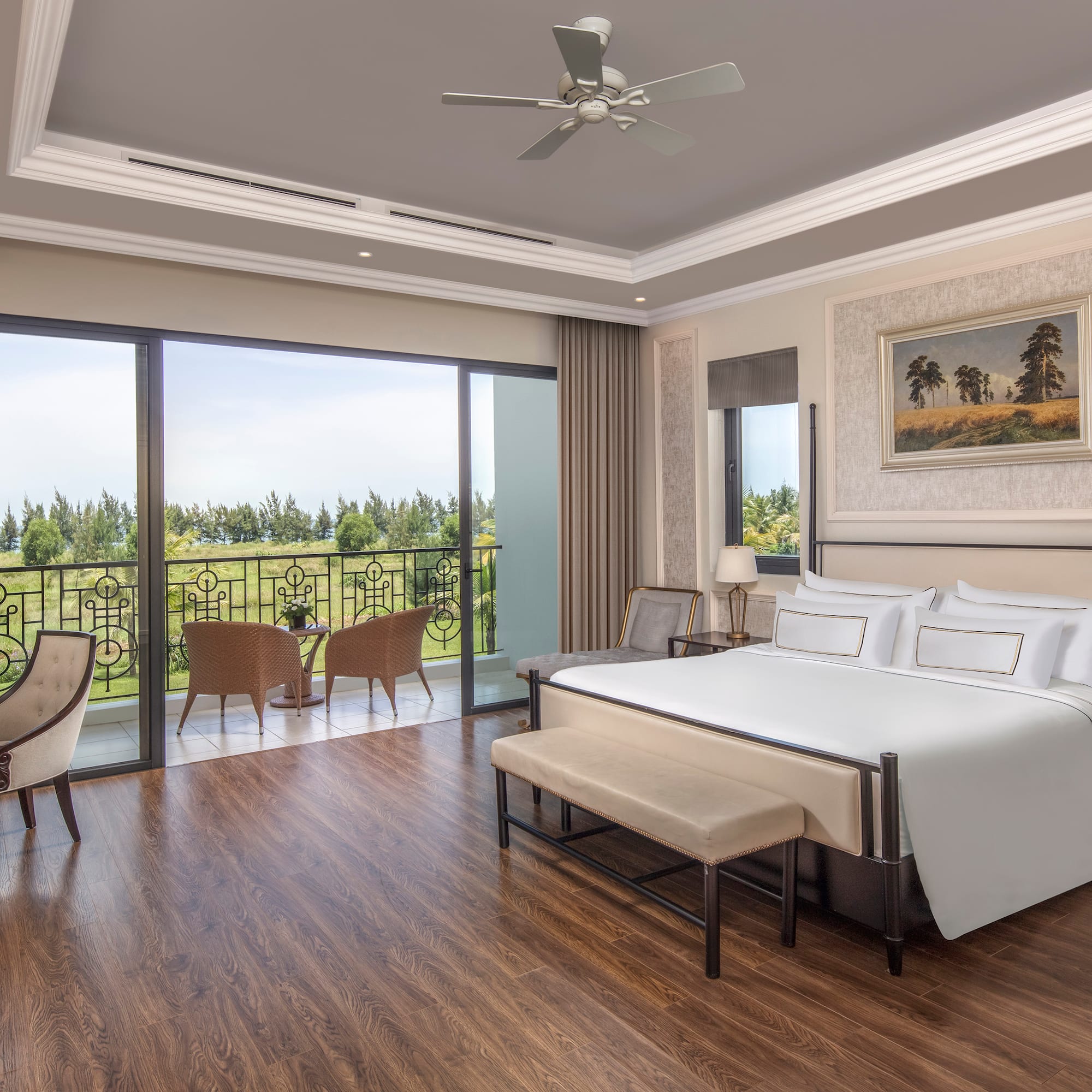 a bedroom with a bed and chairs