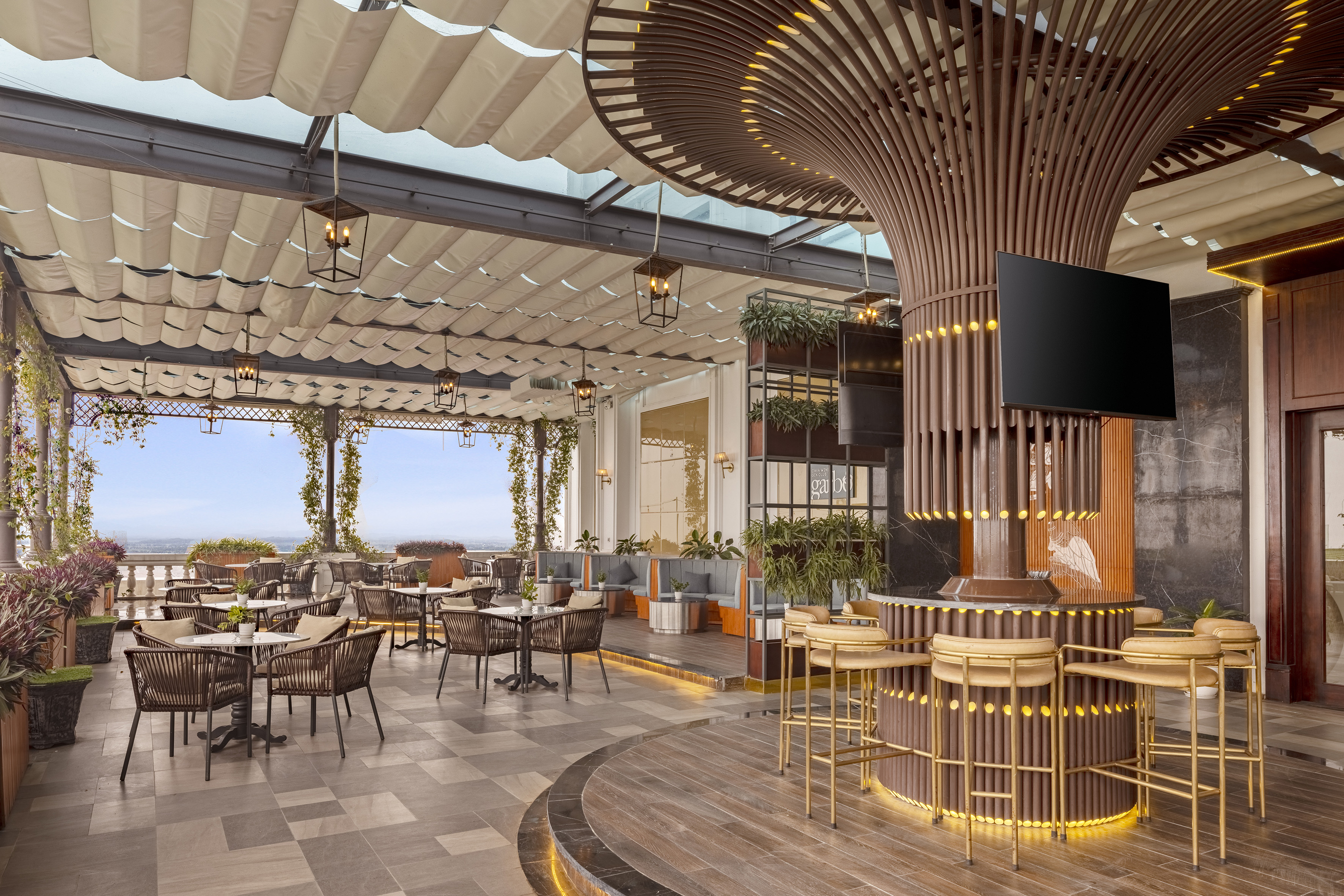 Elegant outdoor rooftop bar and restaurant with panoramic views.