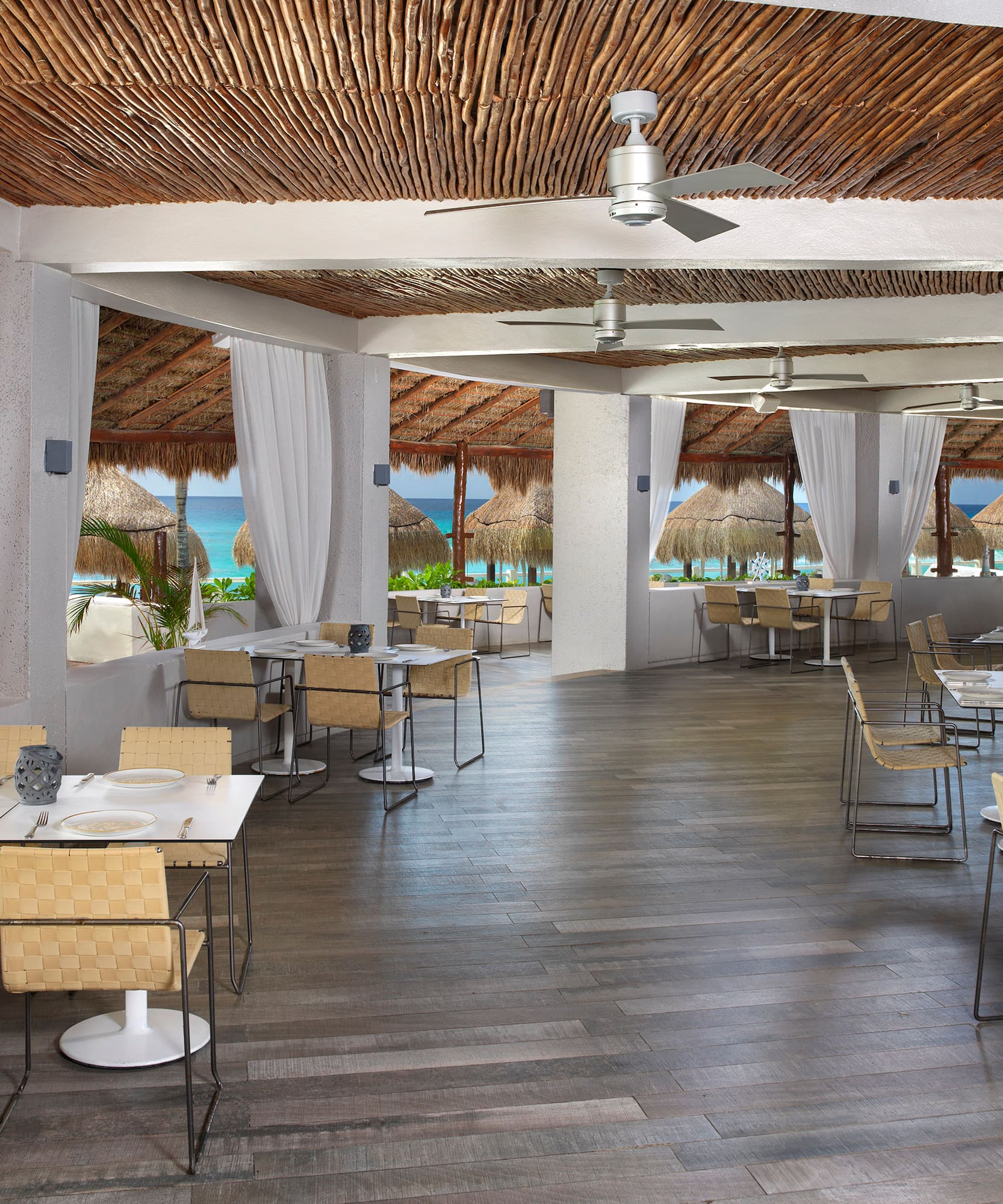 a room with tables and chairs