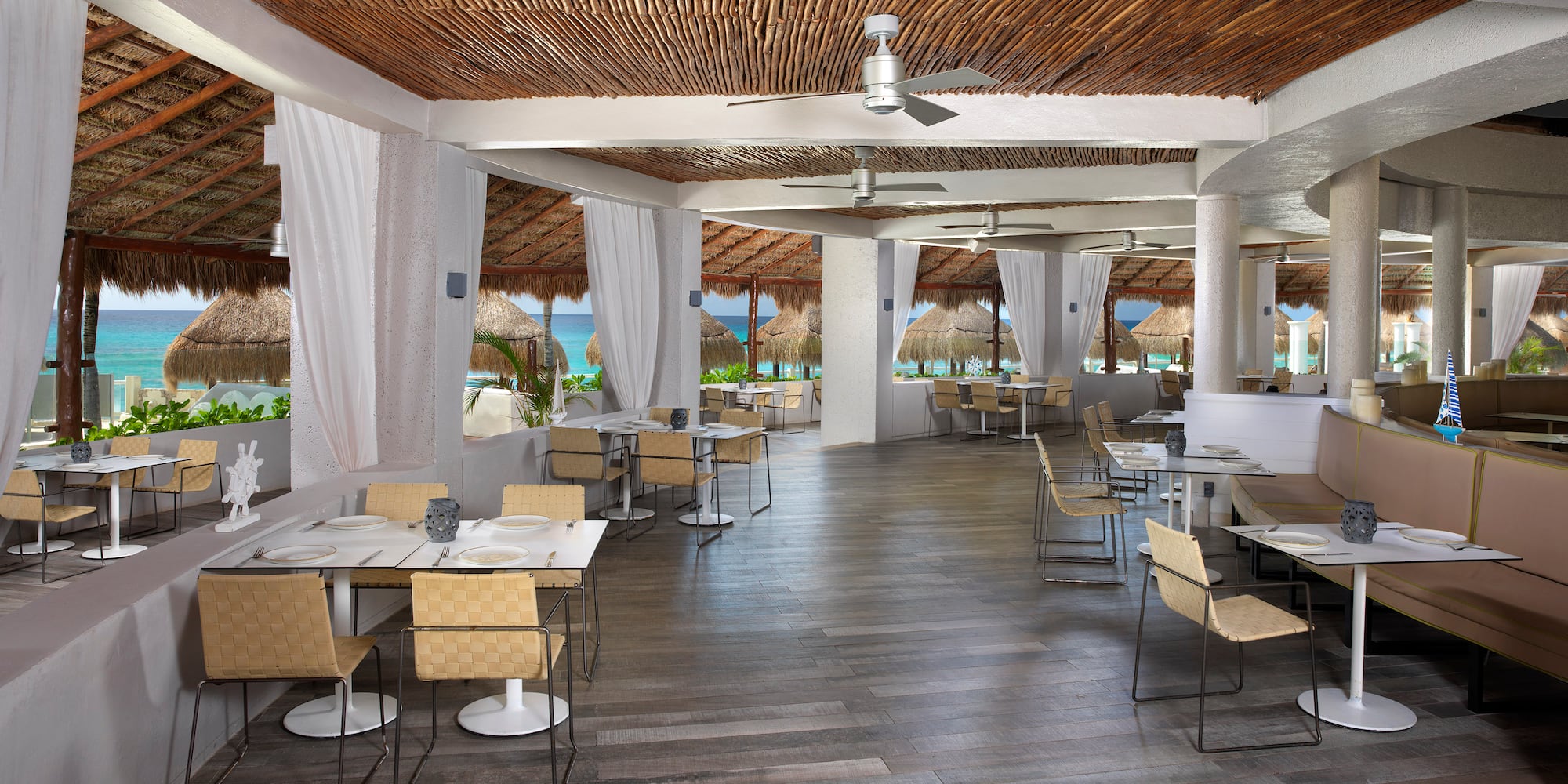 a room with tables and chairs