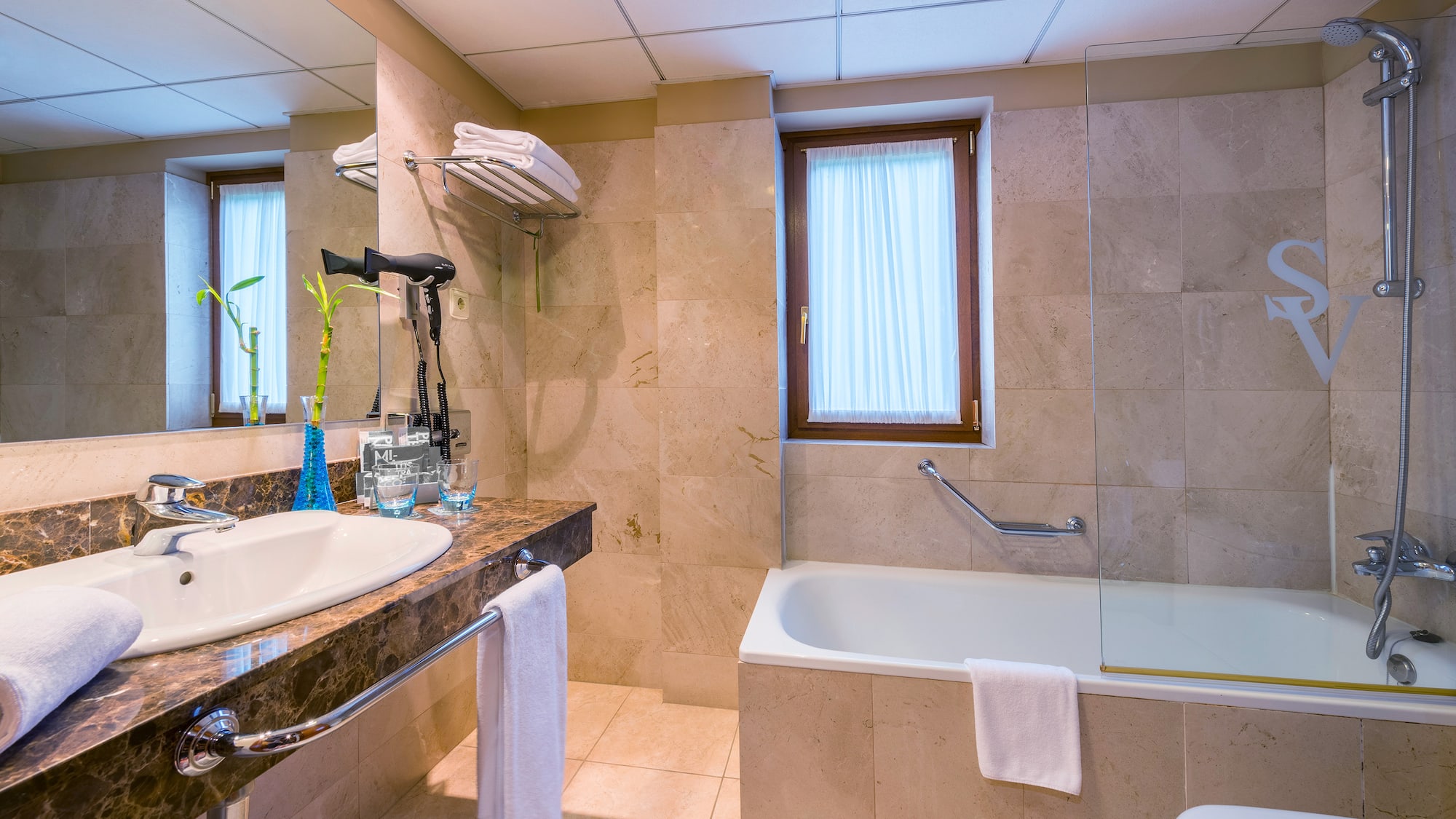 a bathroom with a sink and bathtub