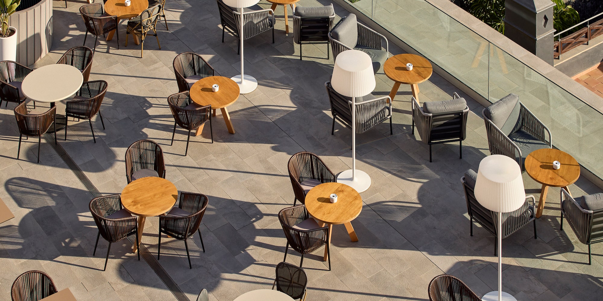 a group of tables and chairs on a patio