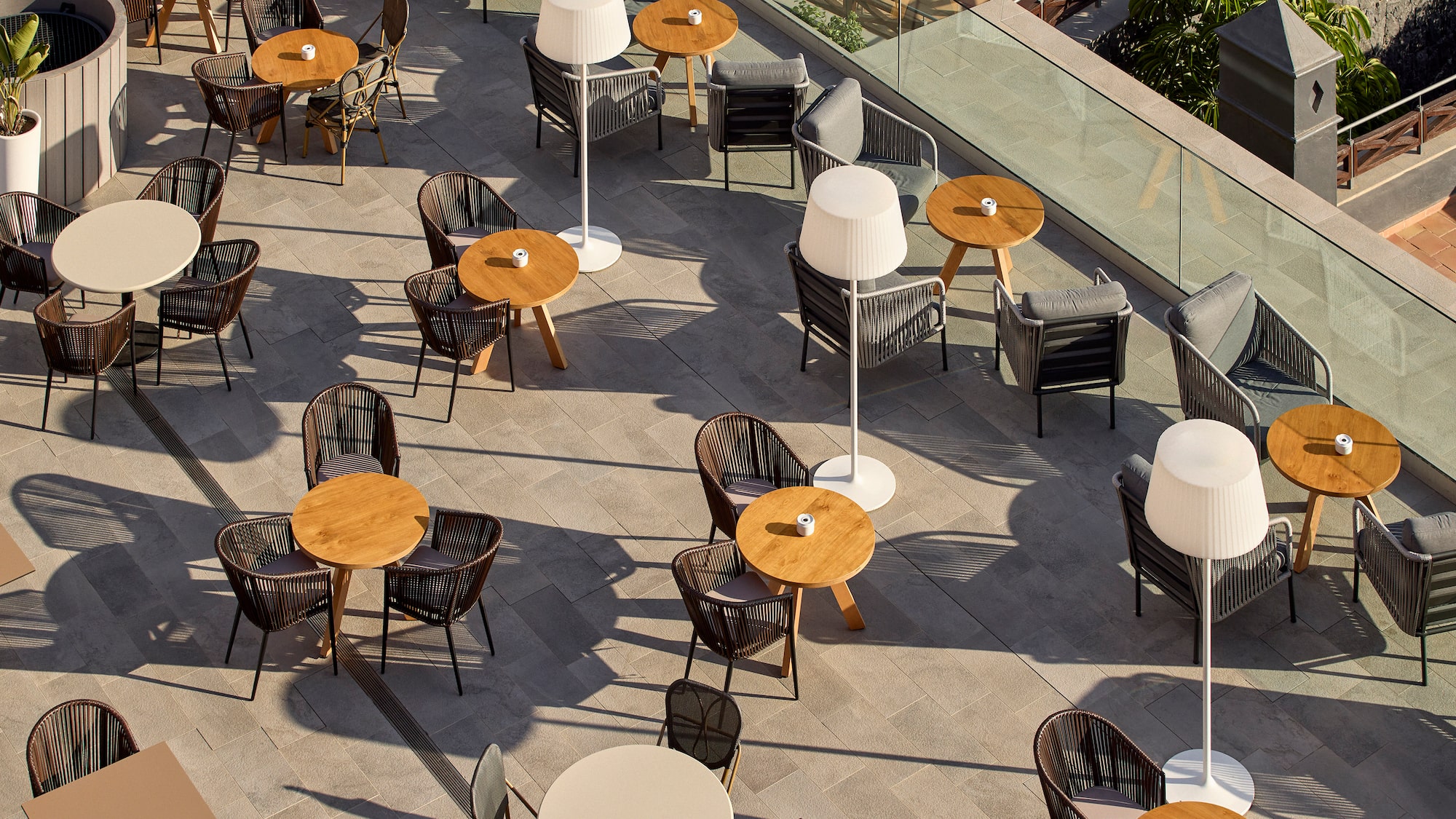 a group of tables and chairs on a patio